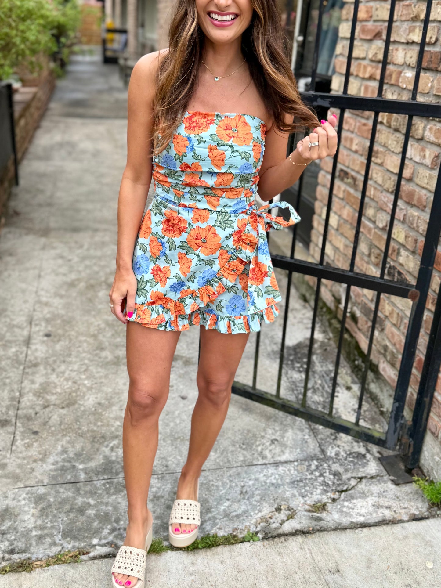Haven Floral Wrap Romper- Jade Orange